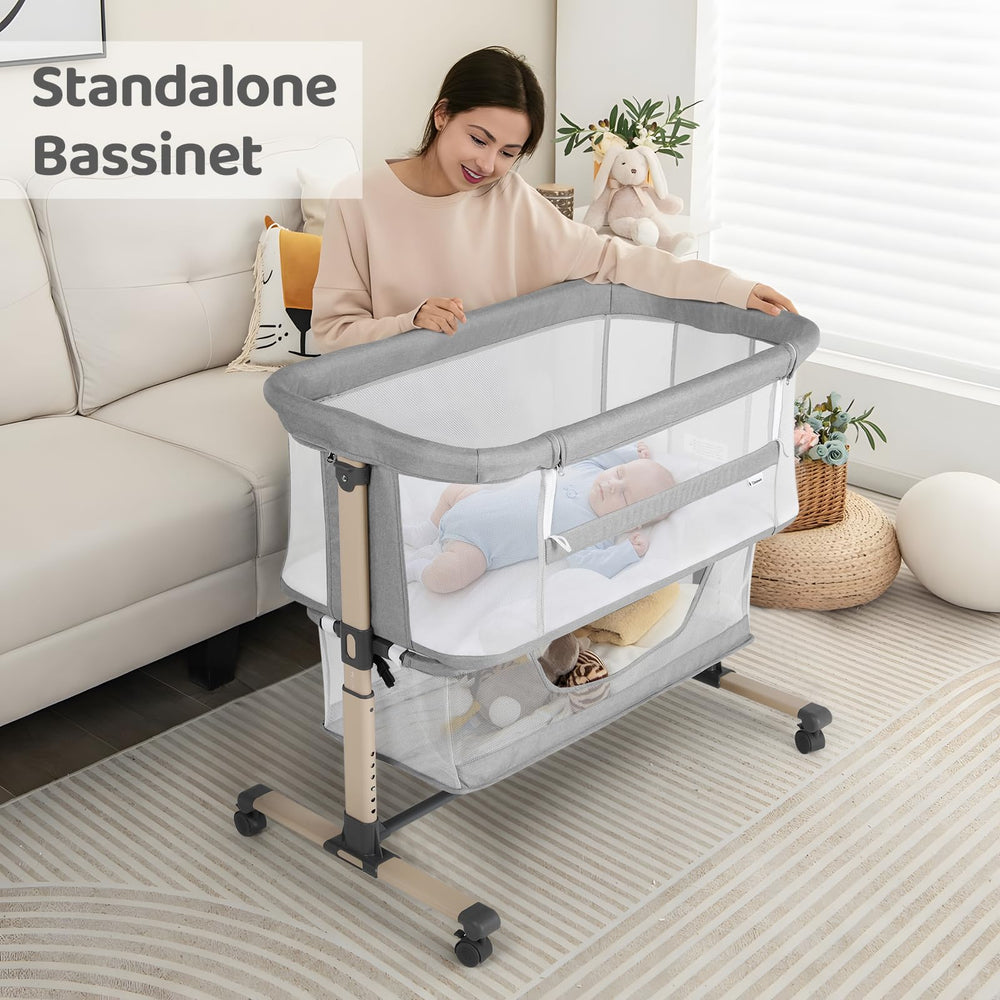 Cowiewie bassinet with four lockable wheels for secure mobility.