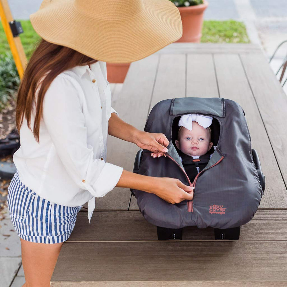 Cozy Cover fits all standard carriers with a simple shower cap design.