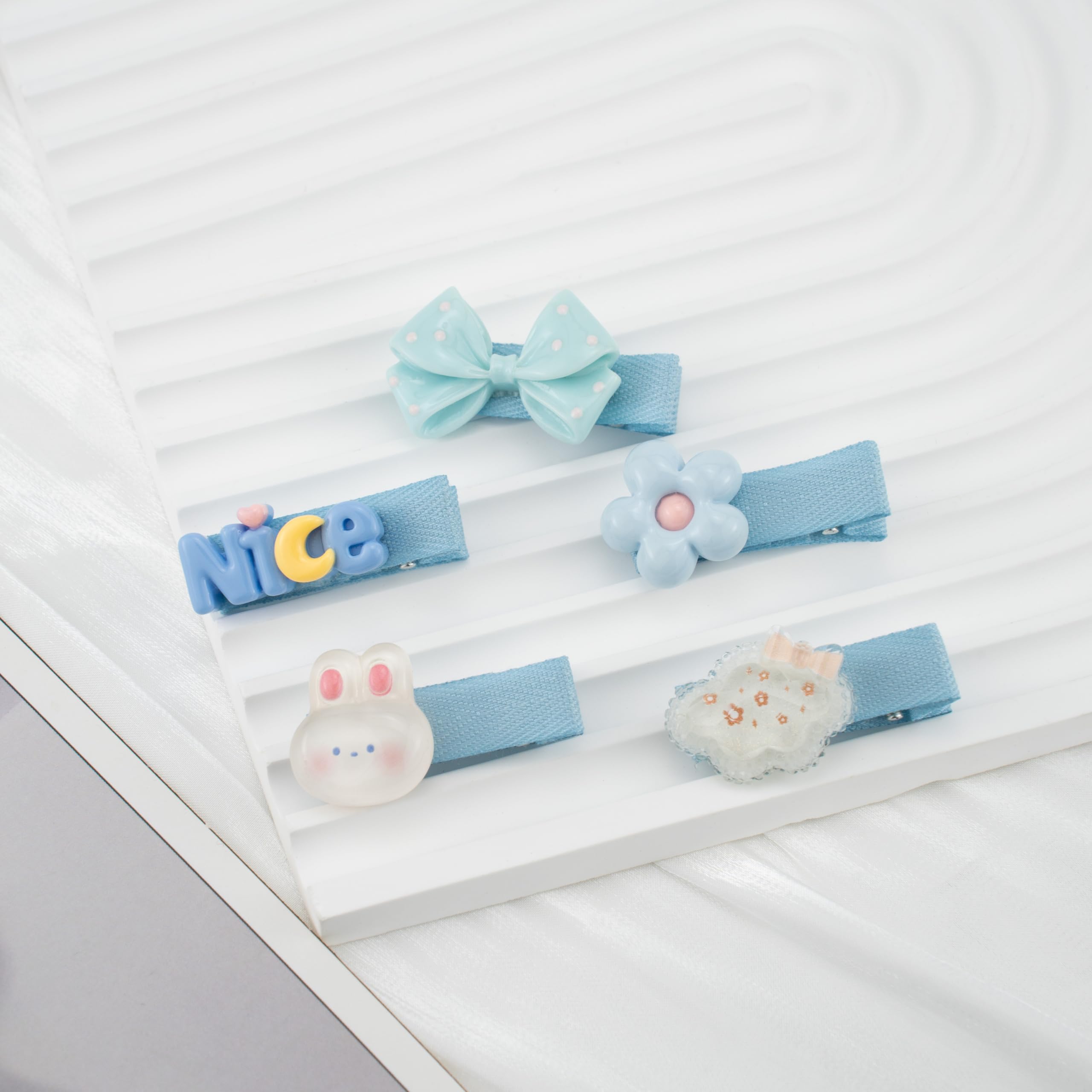 COZYISLE elephant and flower clip provides gentle grip