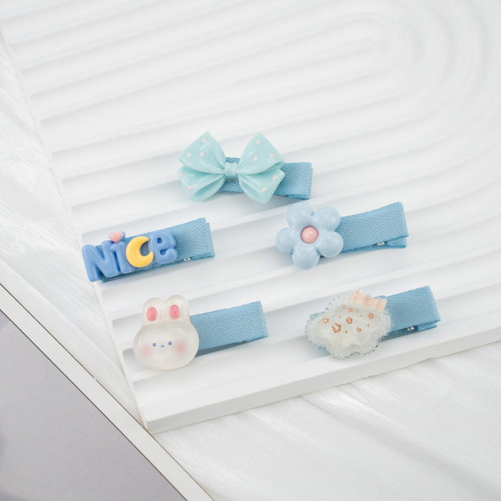 COZYISLE elephant and flower clip provides gentle grip