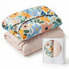 CozysBunny Muslin crib sheet with colorful flowers pattern offers soft, breathable comfort.