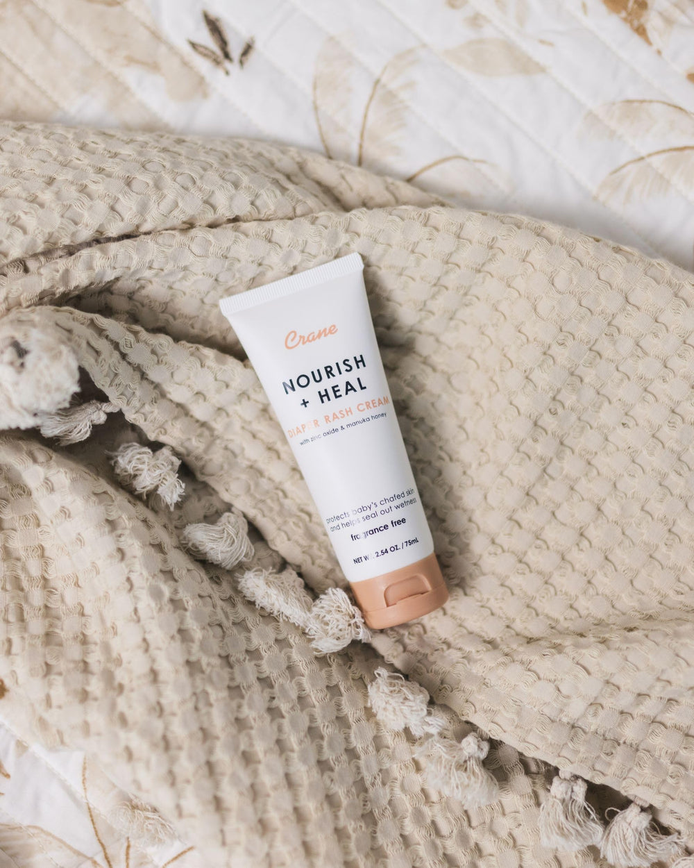 Crane Baby Diaper Cream barrier-action demonstrates moisture sealing for comfort.
