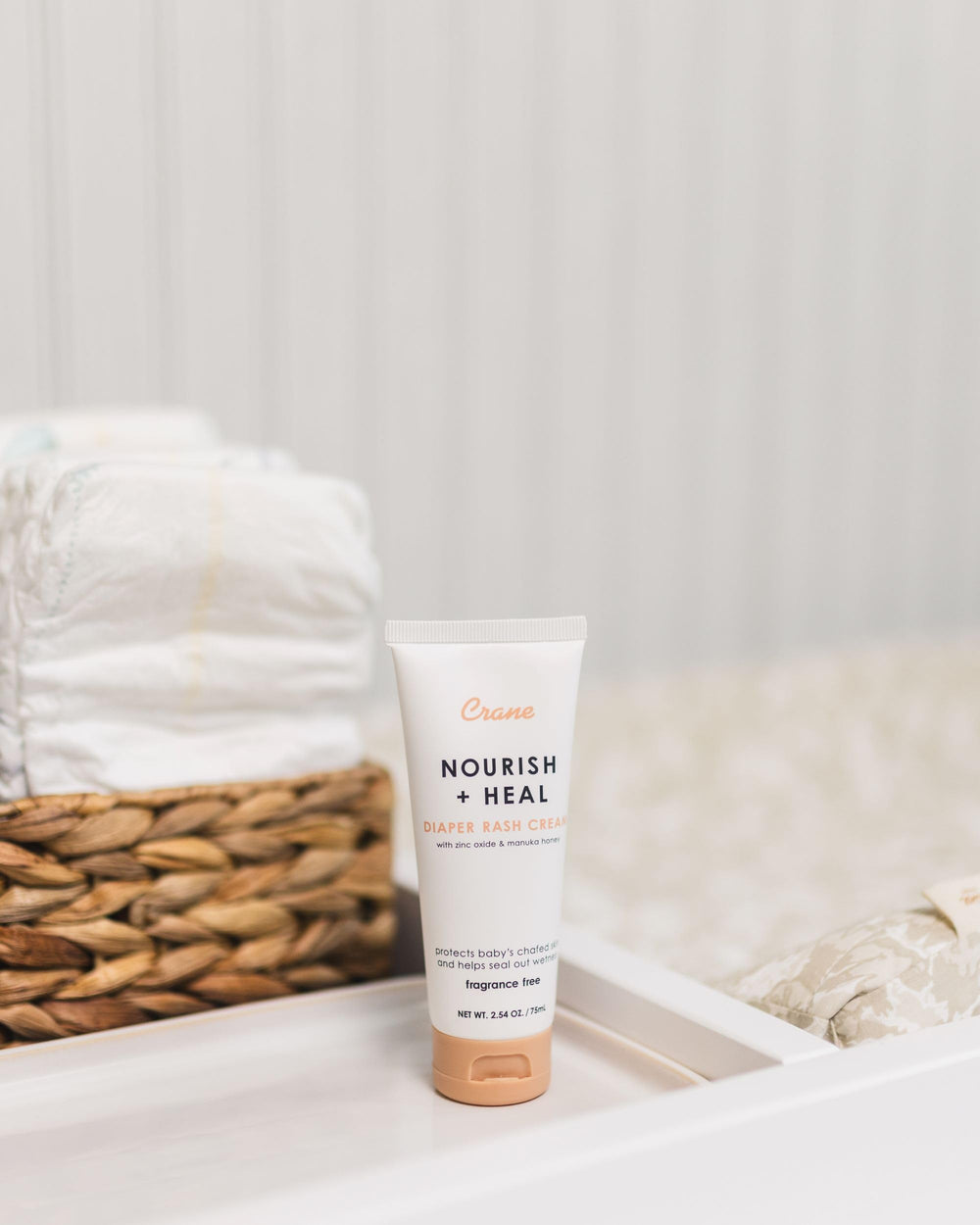 Crane Baby Diaper Cream packaging closeup communicates trusted care from Crane Baby.