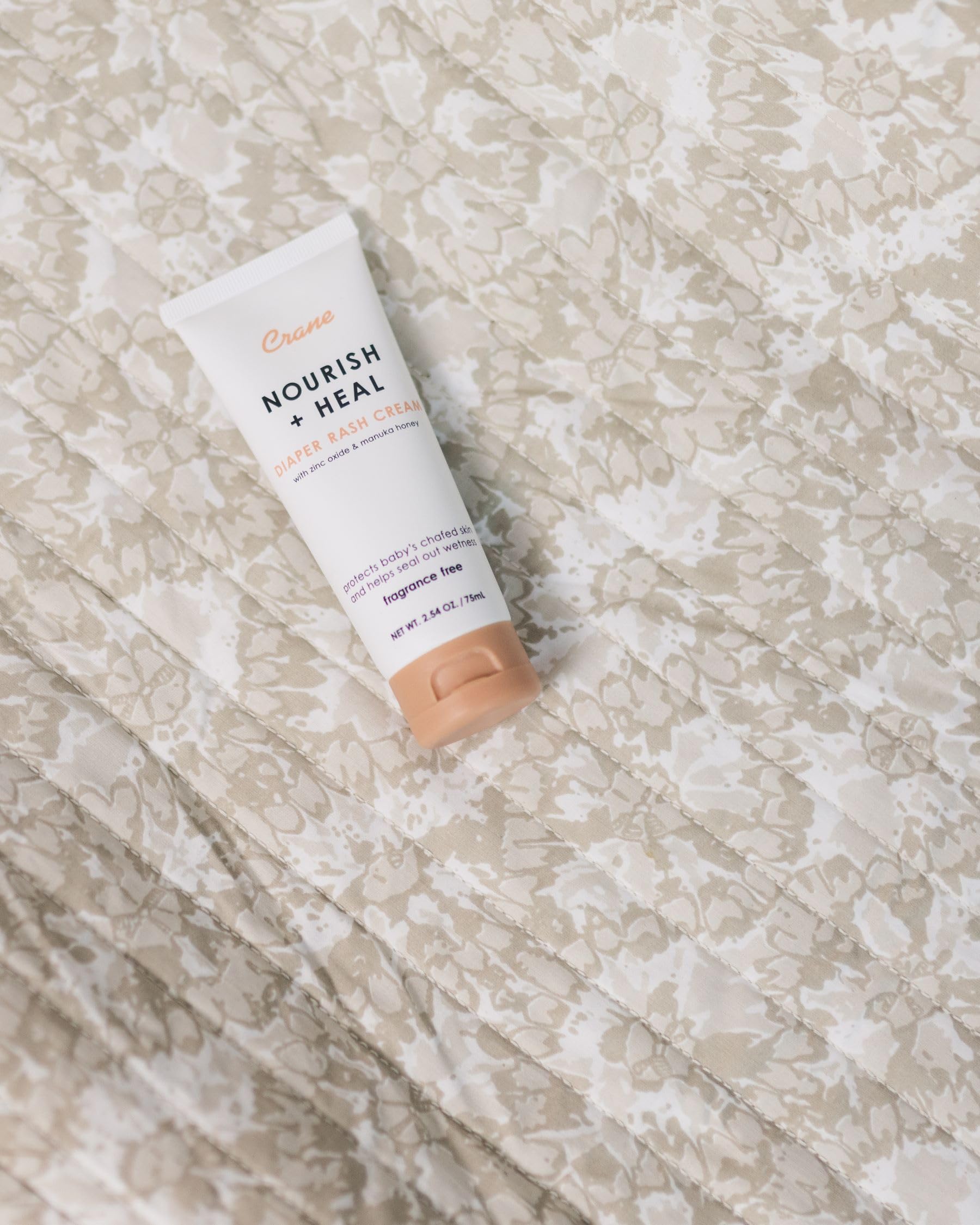 Crane Baby Diaper Cream soft-skin application suggests soothing relief after changes.