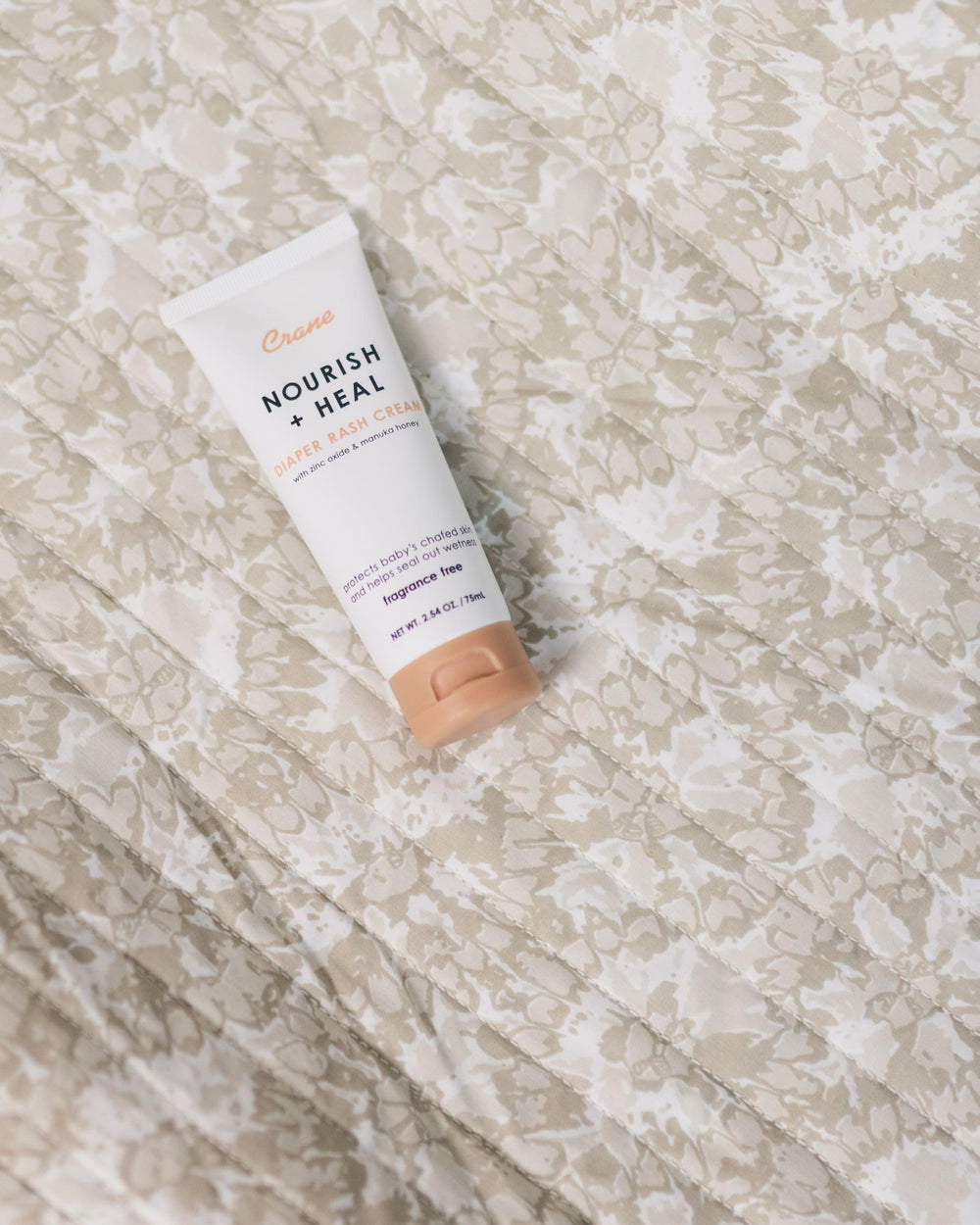 Crane Baby Diaper Cream soft-skin application suggests soothing relief after changes.