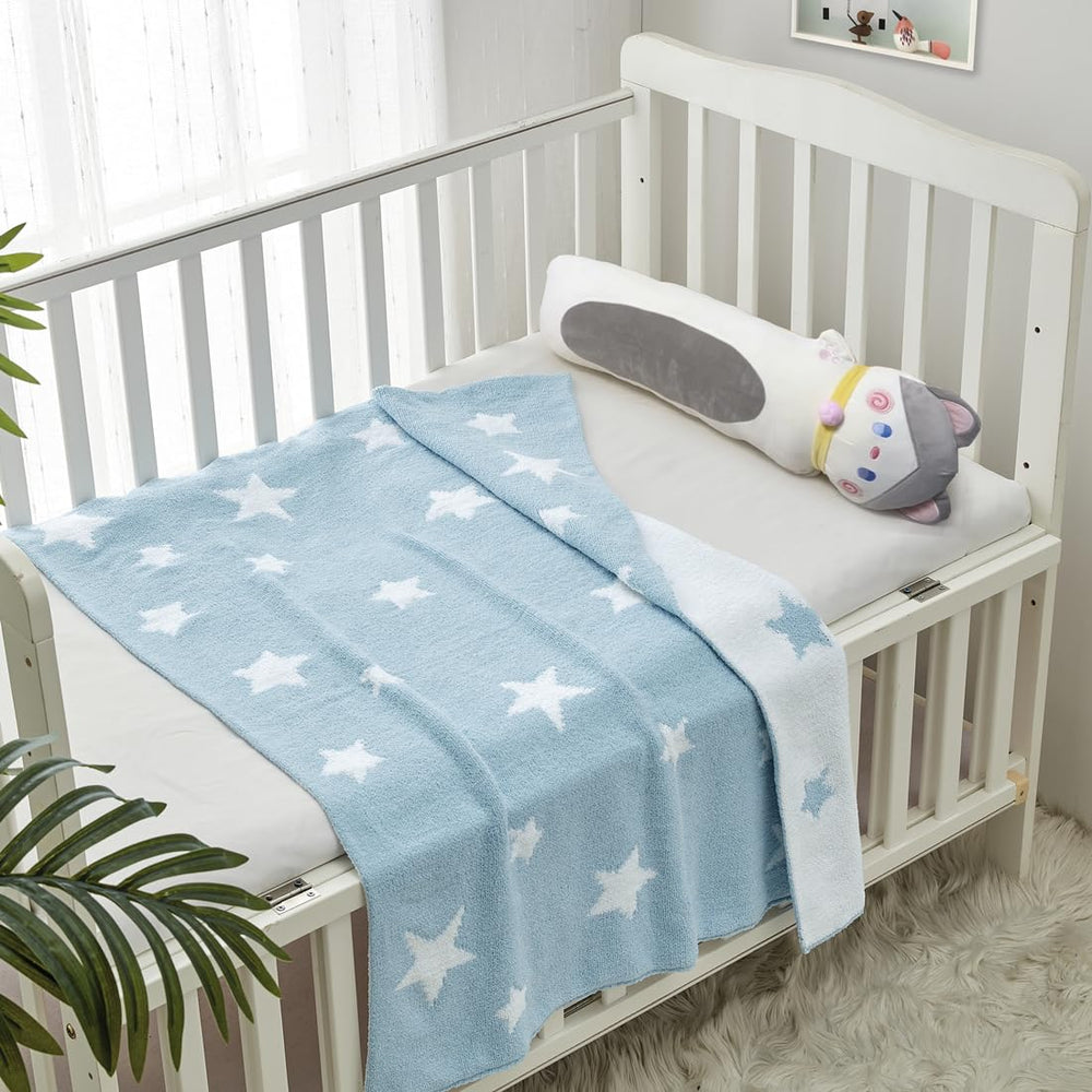 CREVENT blue star blanket in nursery setting offers tummy time comfort
