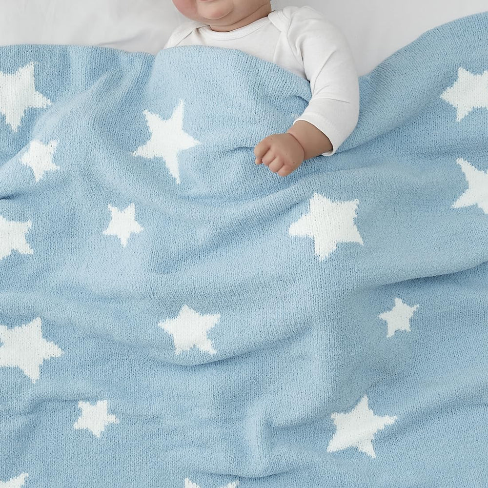 CREVENT blue star blanket used as stroller cover for on-the-go warmth