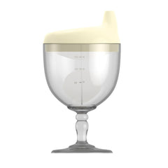Crumye fancy wine glass sippy bottle yellow front view, spill-proof design for toddlers.
