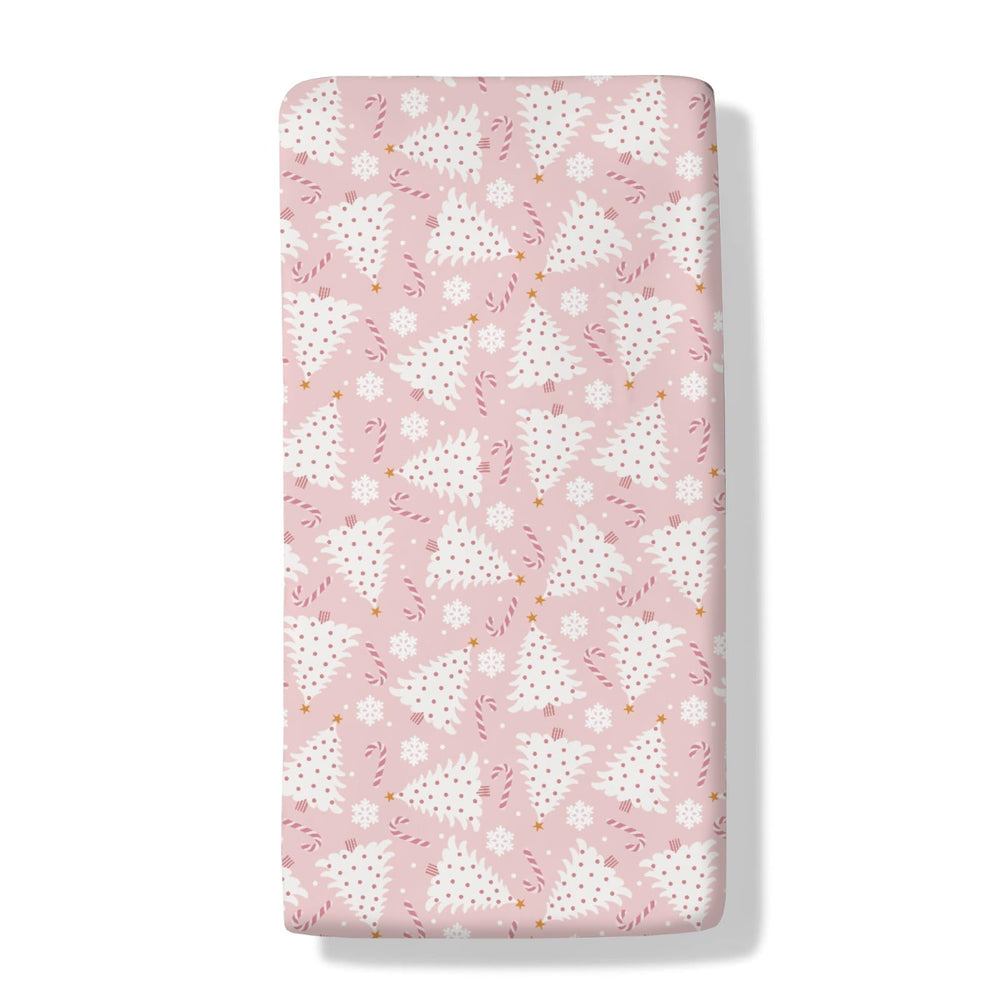 Cstdyfrv pink Christmas trees crib sheet adds festive charm to baby's sleep routine.
