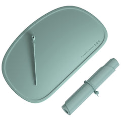 Cuddle Campus silicone placemat with raised edges contains spills at mealtime