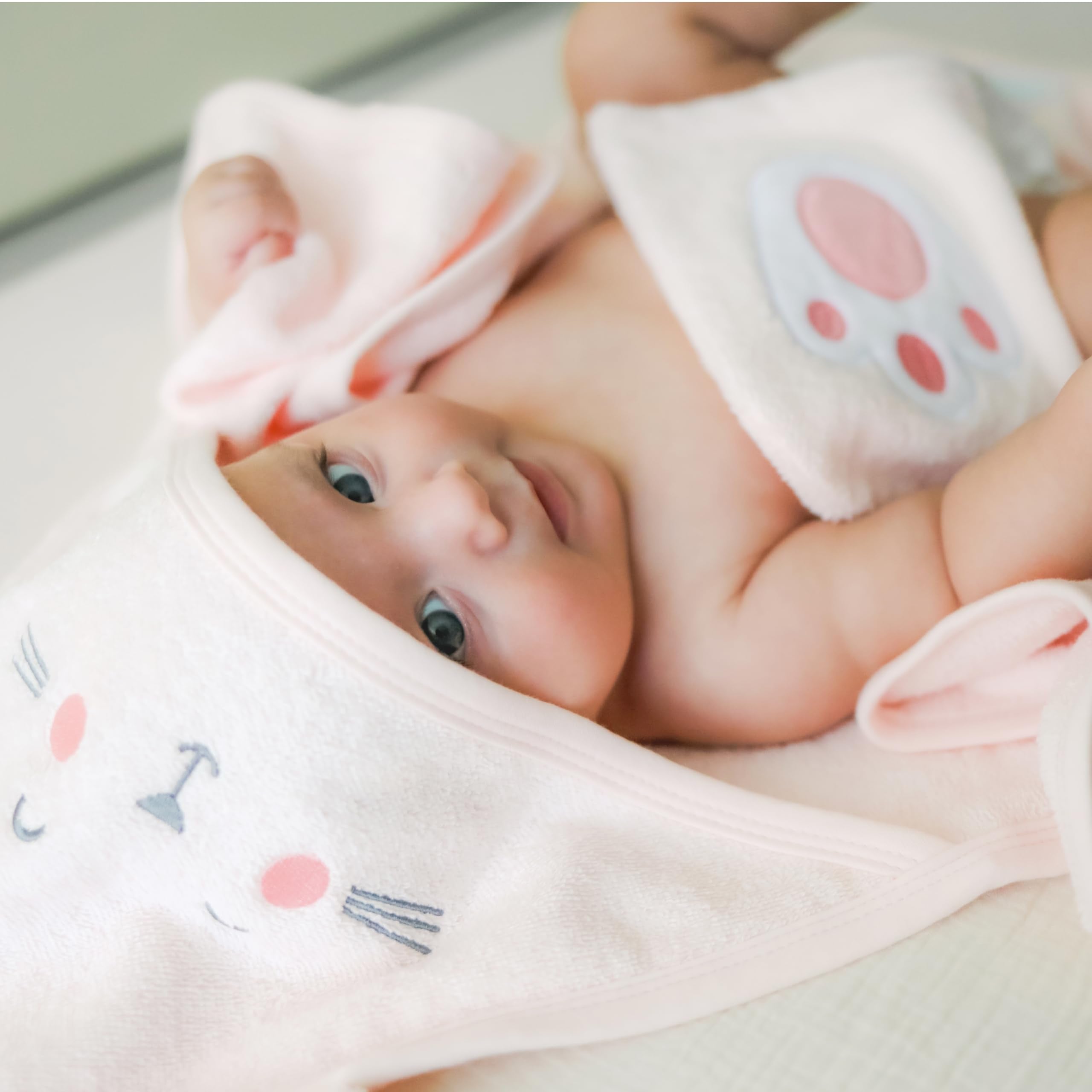 CuddleBug quick-dry towel display, machine-washable for busy families