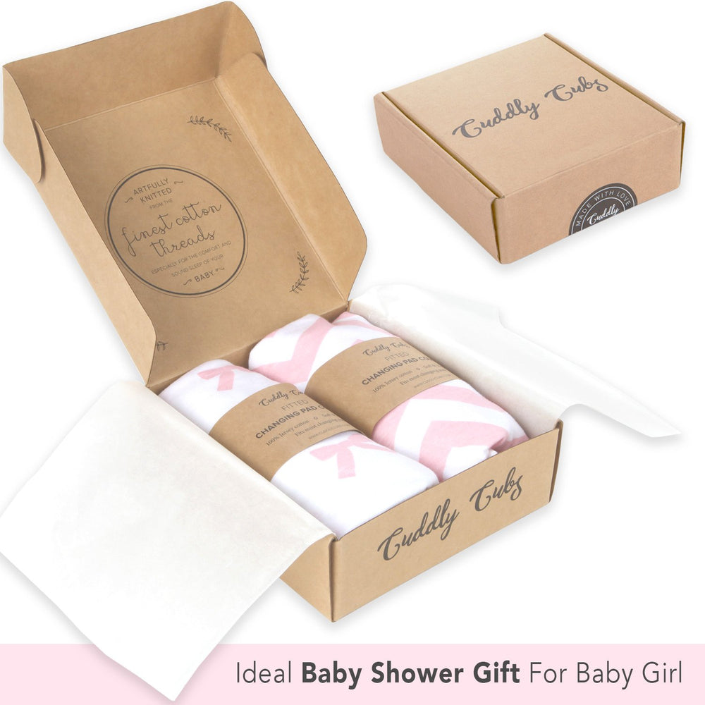 Cuddly Cubs pink cover adds cozy softness for baby changes.