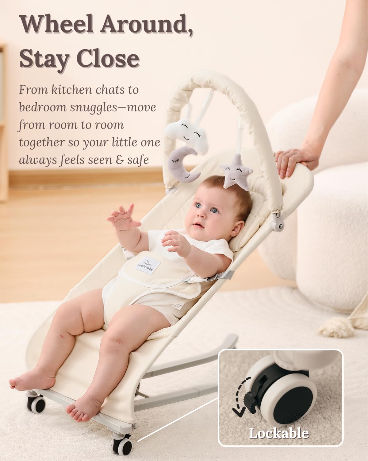 CuddoBaby bouncer beige with hanging toys promoting early hand-eye coordination