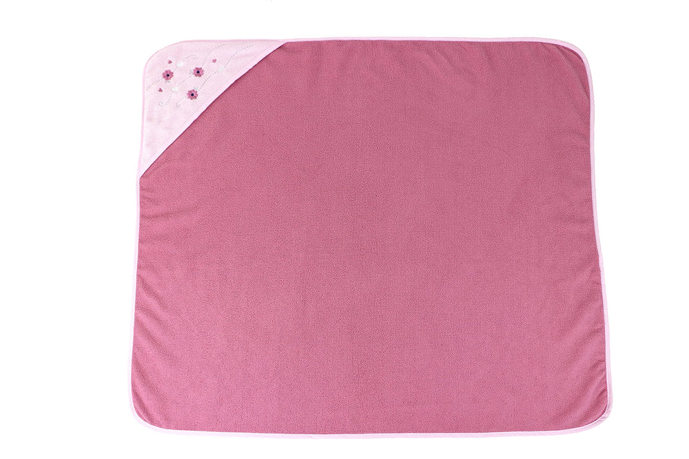 Cudlie Buttons & Stitches hooded towel absorbency demonstrated by plush weave