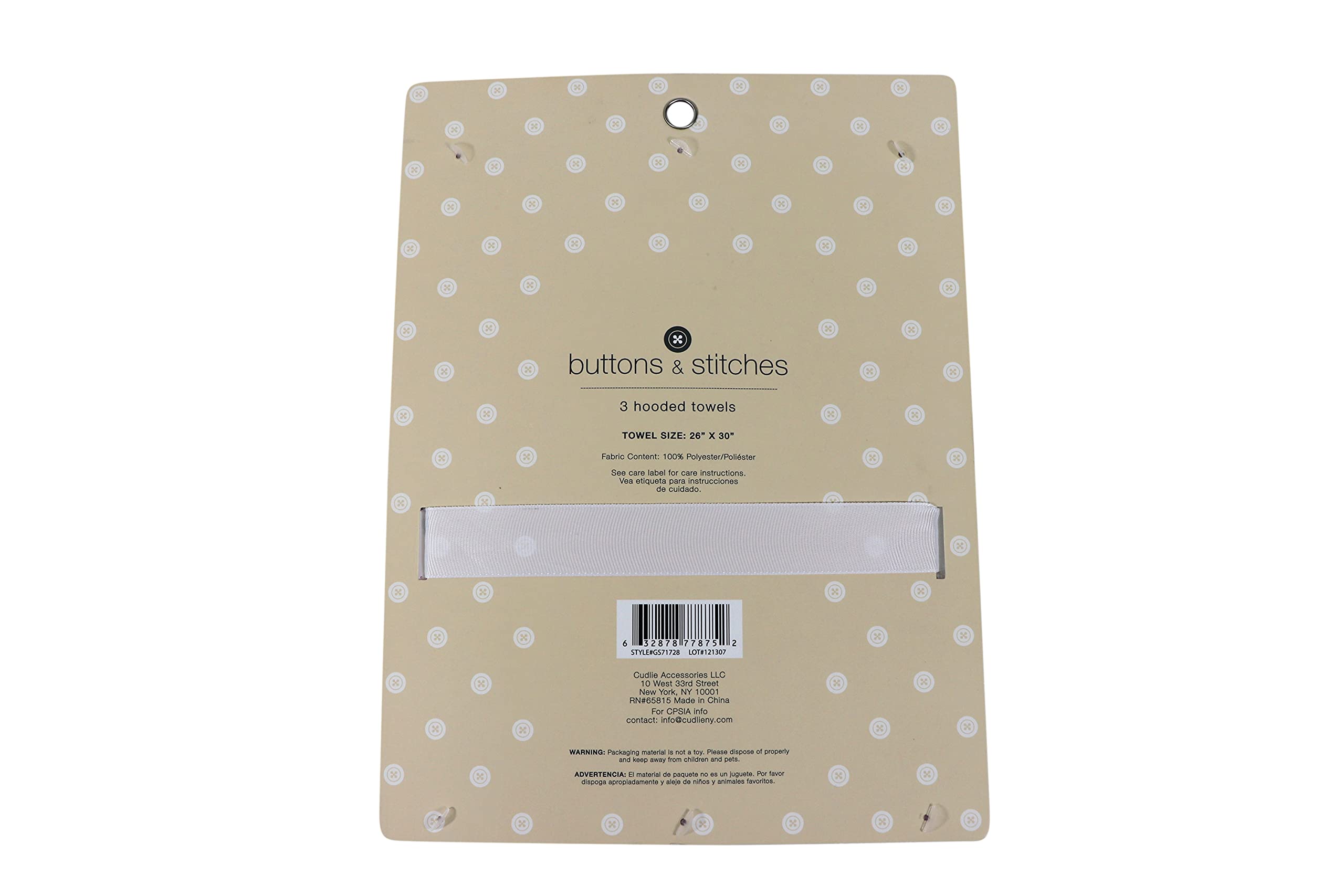 Cudlie Buttons & Stitches hooded towels folded for compact storage and easy access