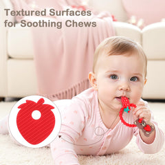 CulinaCraft Valentine’s teether in baby's hand for easy grip and exploration.