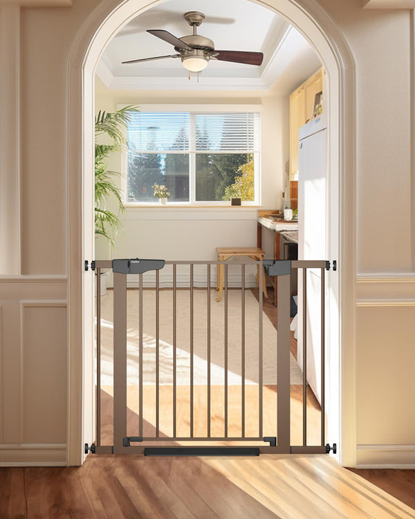 Cumbor baby gate on stairs with auto-close feature for safety