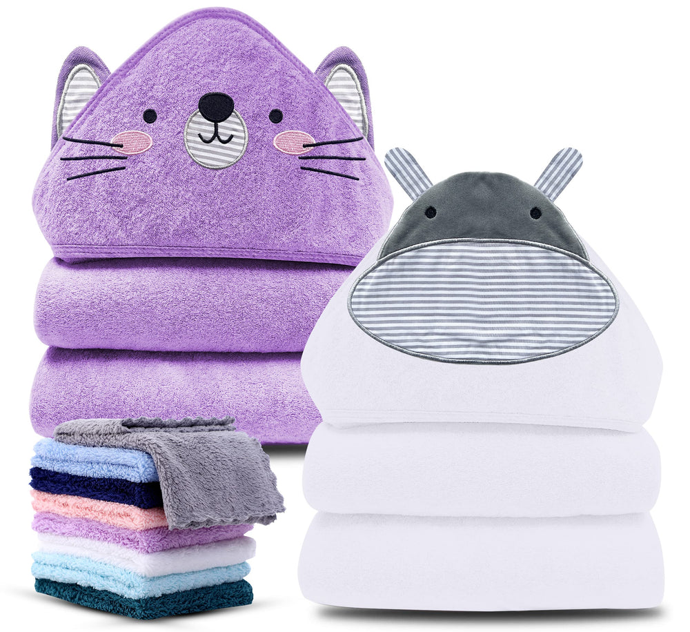 Cute Castle hooded towel hippo in baby bath, warm and playful moment.