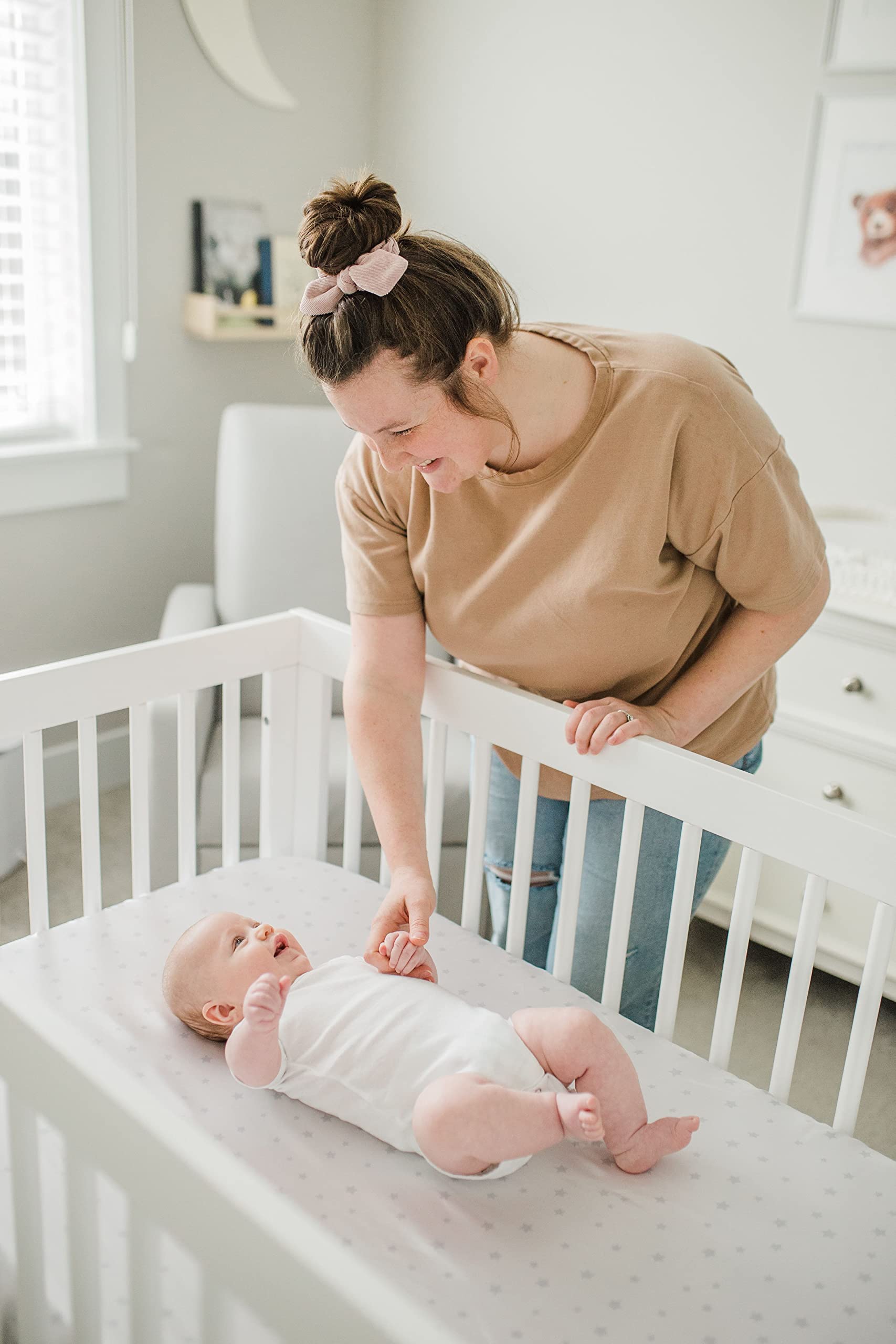 CutieCozy satin crib sheet standard fit for cribs and toddler beds.