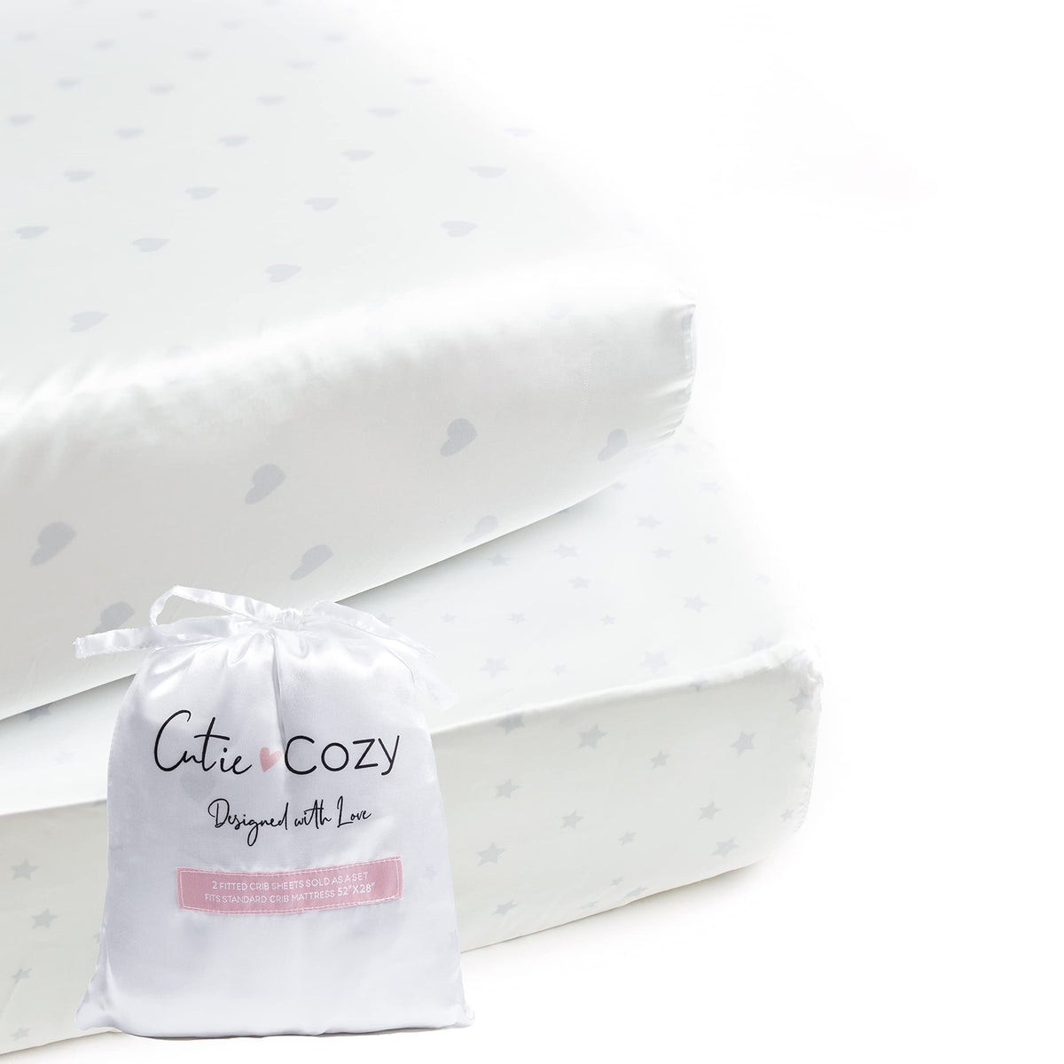 CutieCozy satin fitted crib sheet in white with gray hearts and stars protects delicate baby curls.