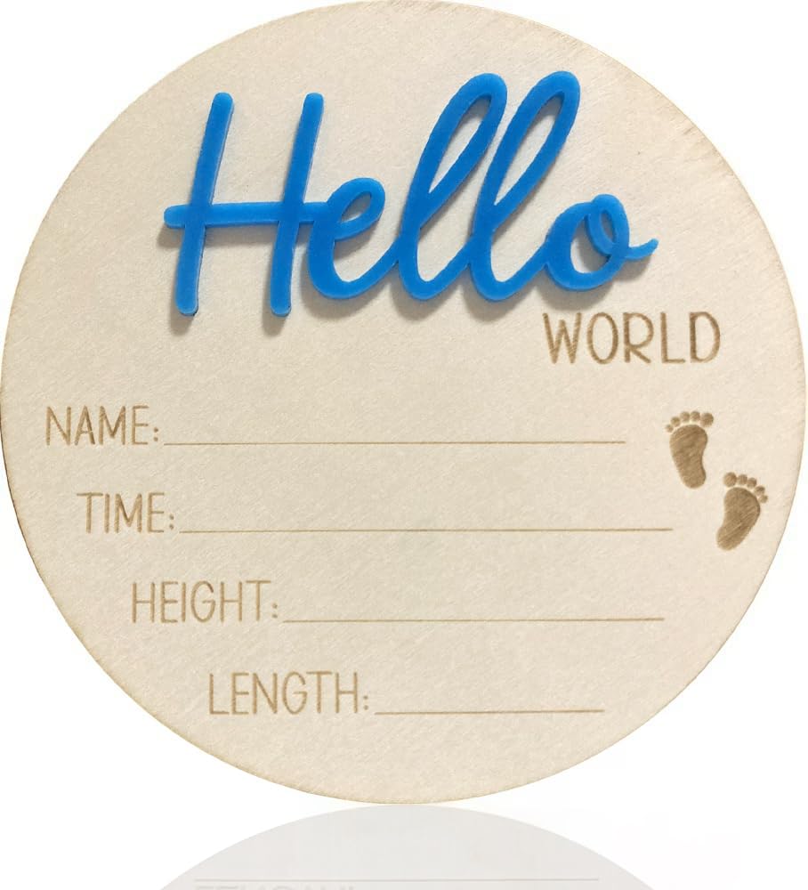 Cuvstvo Hello World baby announcement sign in blue wood for newborn photos.