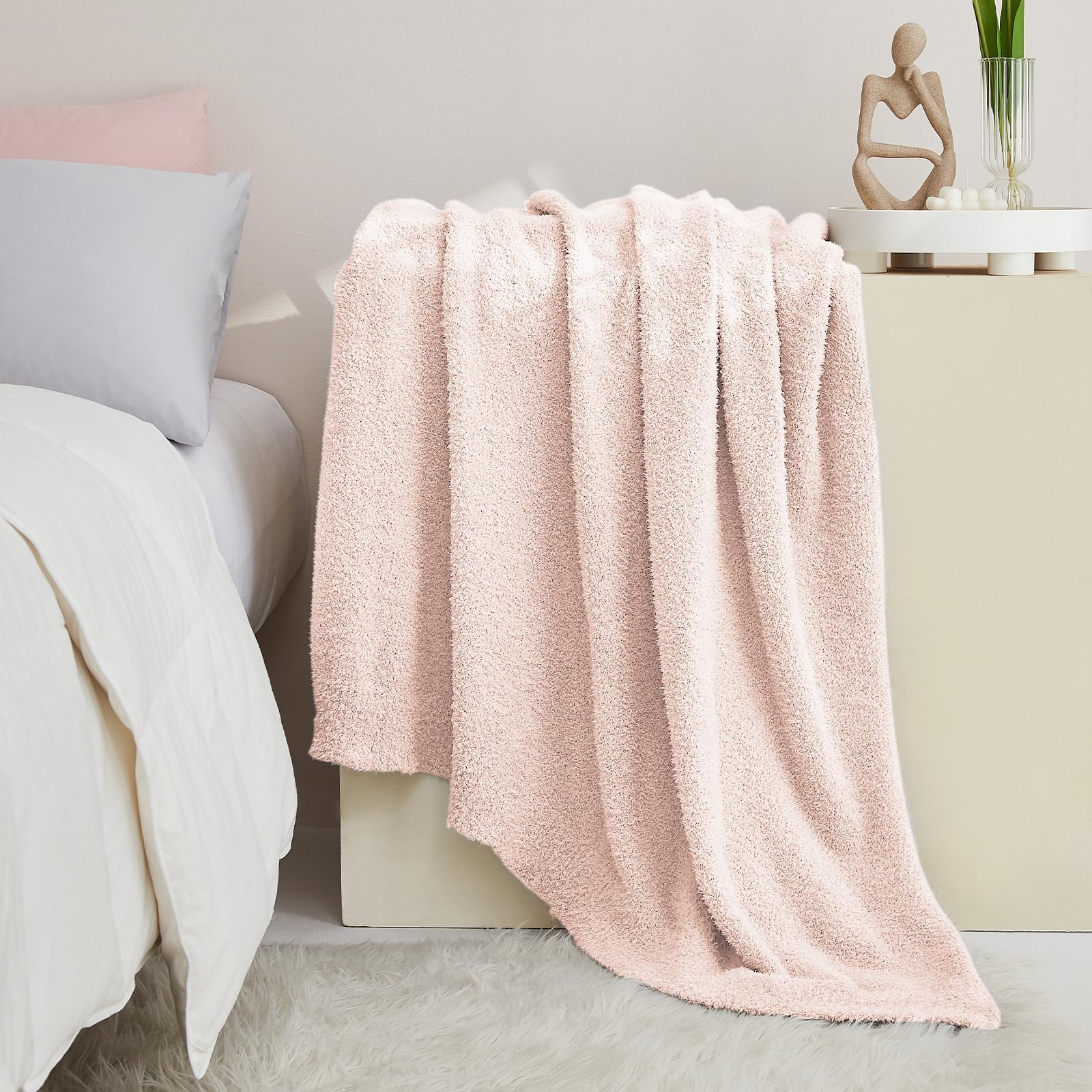 CYMULA cozy pink blanket, a thoughtful gift for loved ones.
