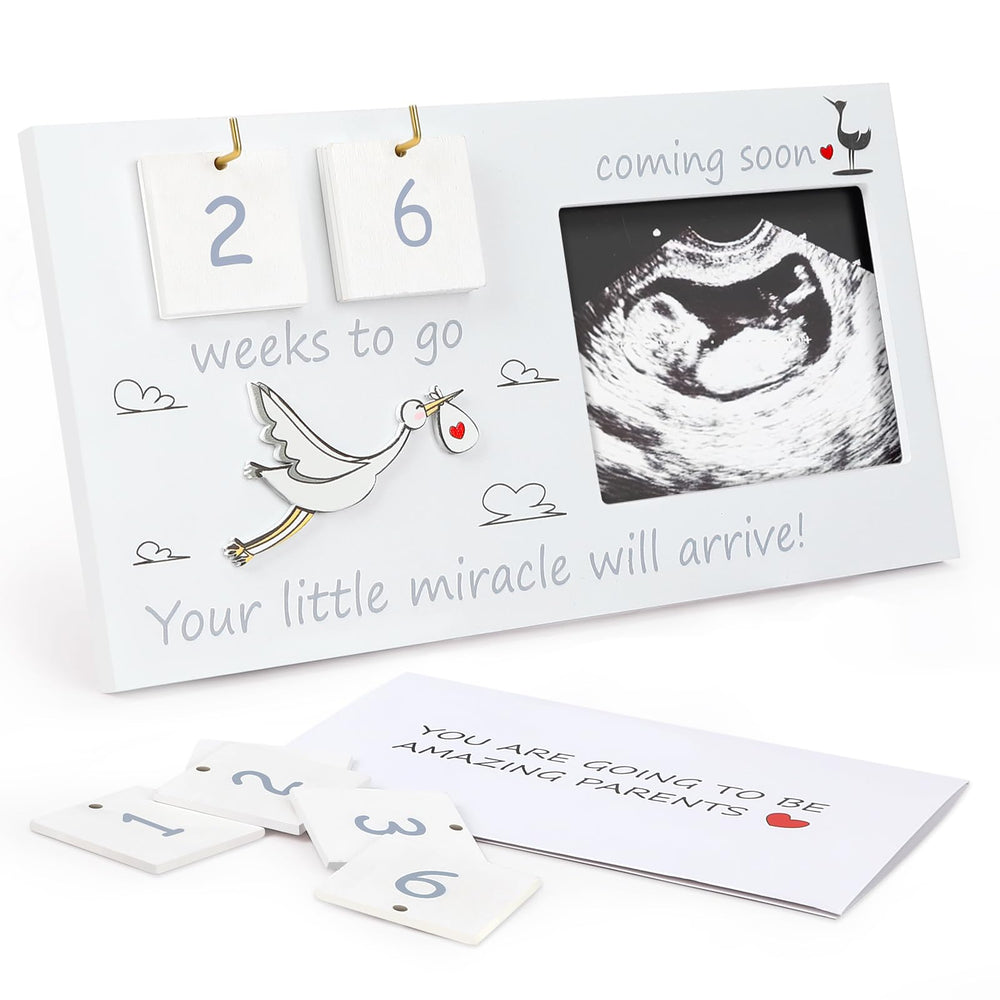 CypherX baby sonogram frame holding a 4x3 ultrasound photo in warm wood.