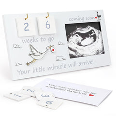 CypherX baby sonogram frame holding a 4x3 ultrasound photo in warm wood.