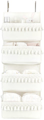 Dahey over-the-door organizer with boho tassels for organized nursery storage.
