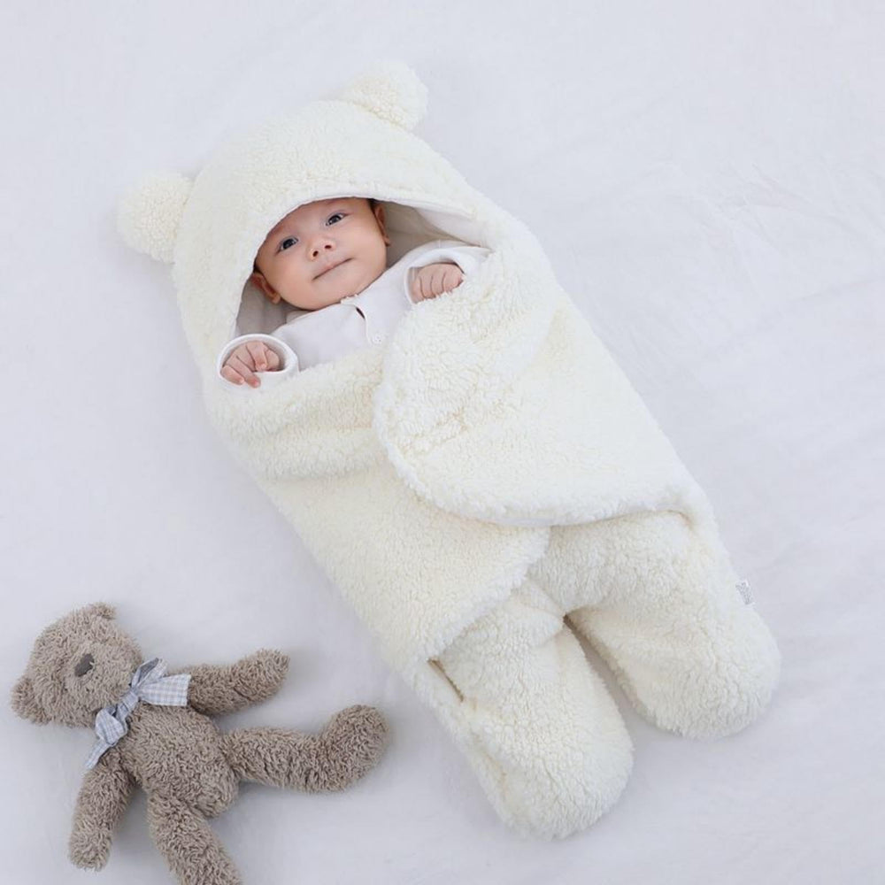 Danolt baby swaddle folded neatly in a dresser for easy storage and packing.