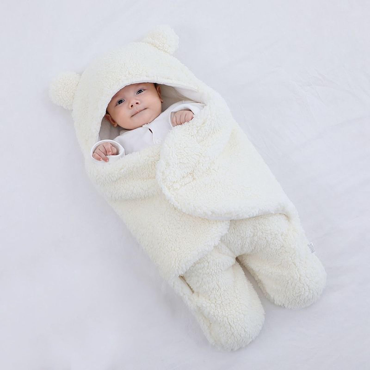Danolt baby swaddle blanket close-up shows soft cotton-poly blend for cozy newborn touch.