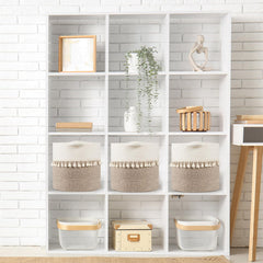 Danpinera white tassel storage basket on bedroom shelf keeps clutter down