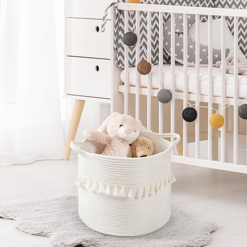 Danpinera cotton-rope weave white round basket offers durable, soft storage.