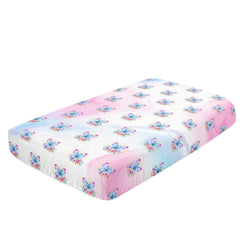 Datura Home close-up of butterfly pattern enhances nursery decor with vibrant colors.
