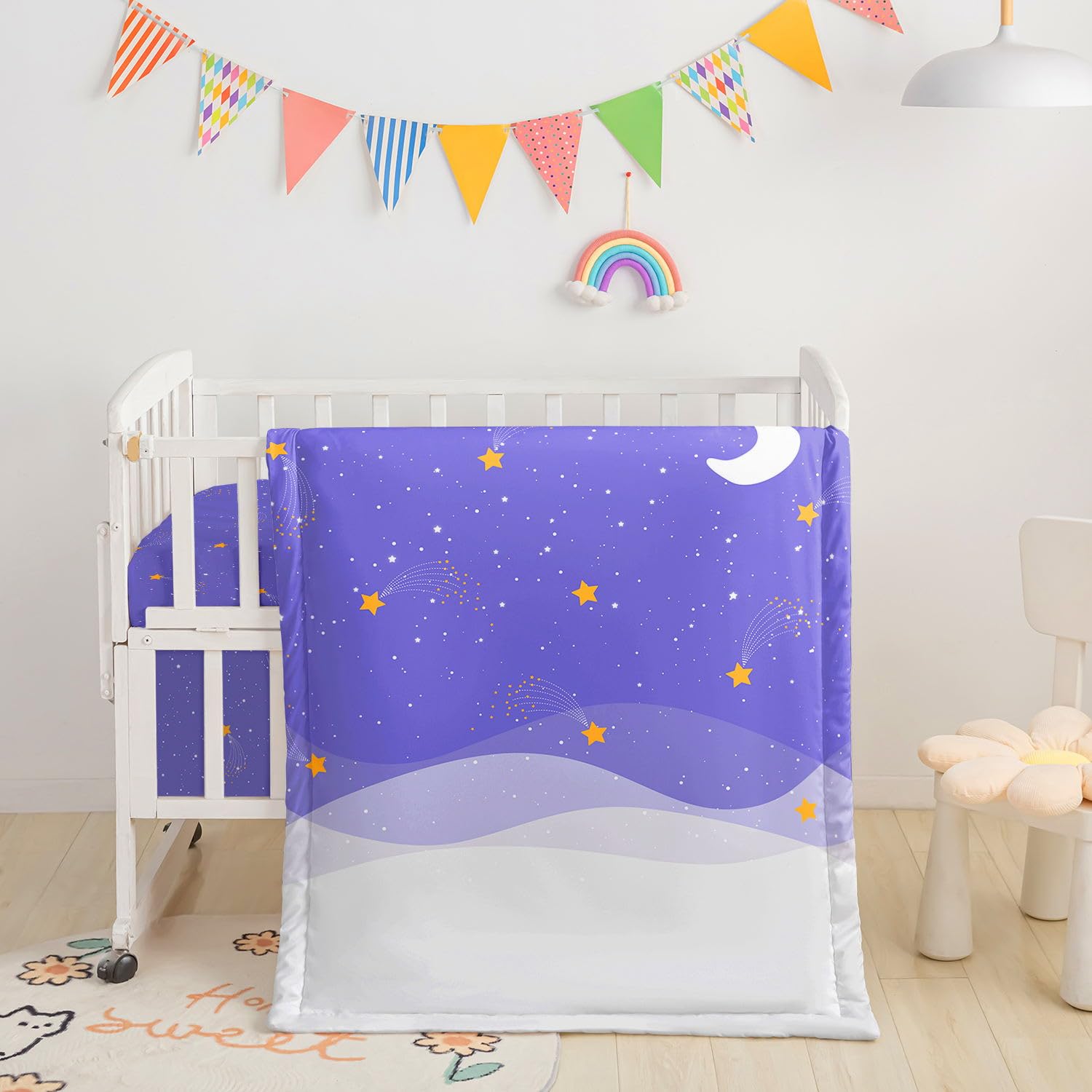 Datura Home crib comforter 34x43 offers soft warmth for nap time.