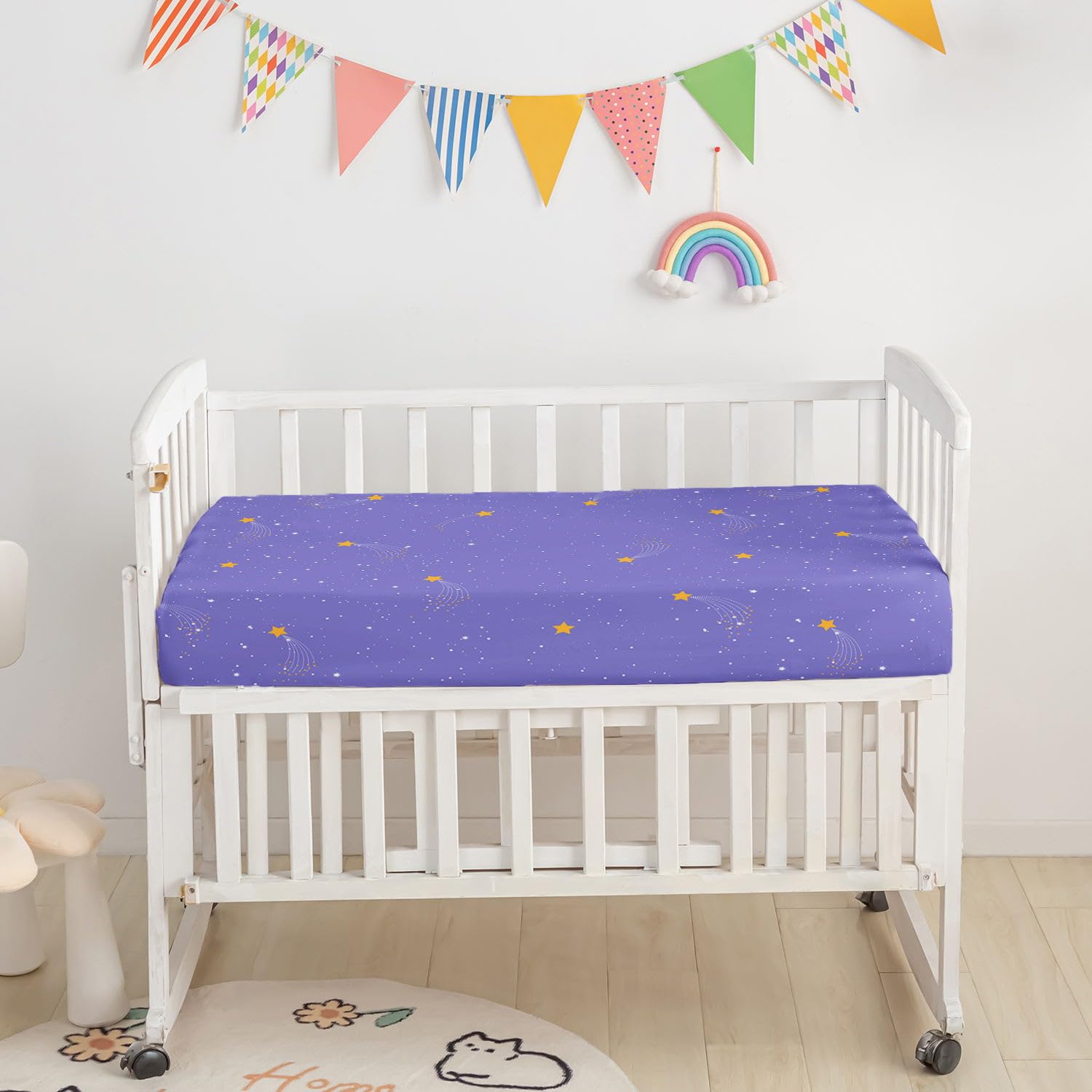 Datura Home crib skirt standard fits neatly beneath the mattress.