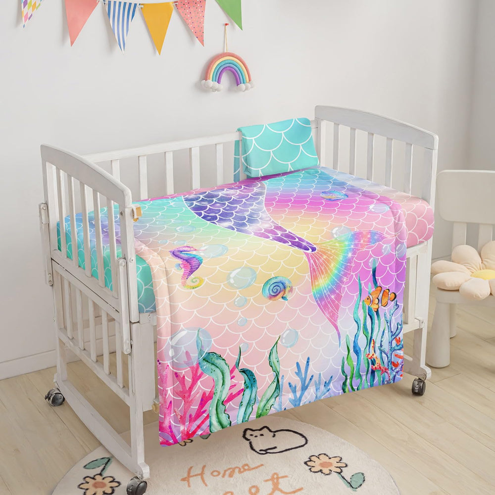 Datura Home mermaid scales fitted sheet keeps baby comfortable and secure