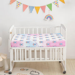 Datura Home crib skirt with butterfly motif adds a tidy finishing touch.