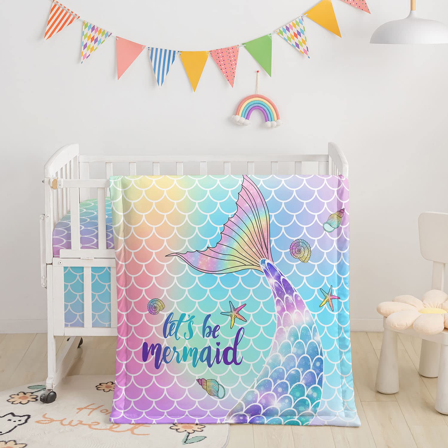 Datura Home quilted comforter with watercolor butterfly print for baby's crib