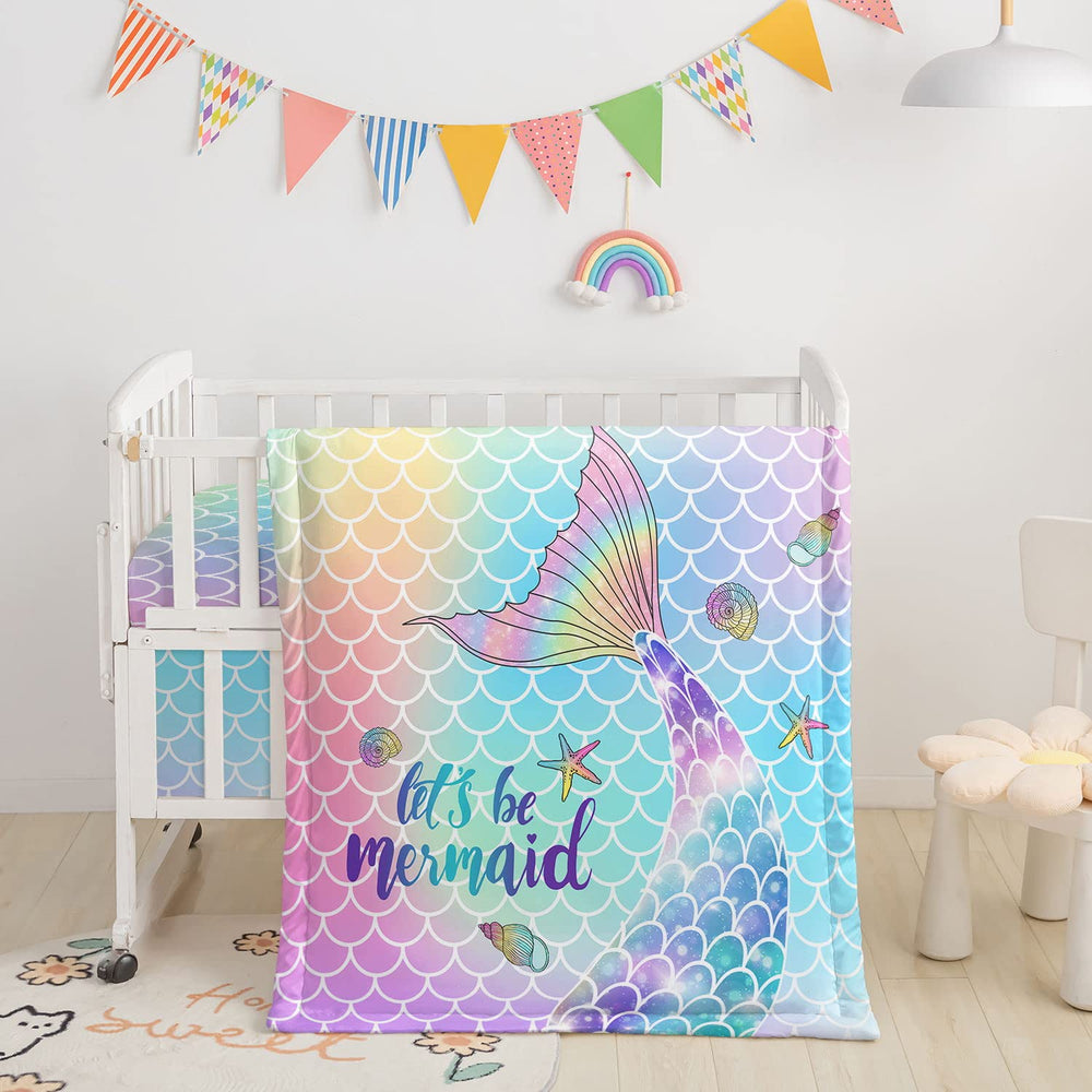 Datura Home quilted comforter with watercolor butterfly print for baby's crib