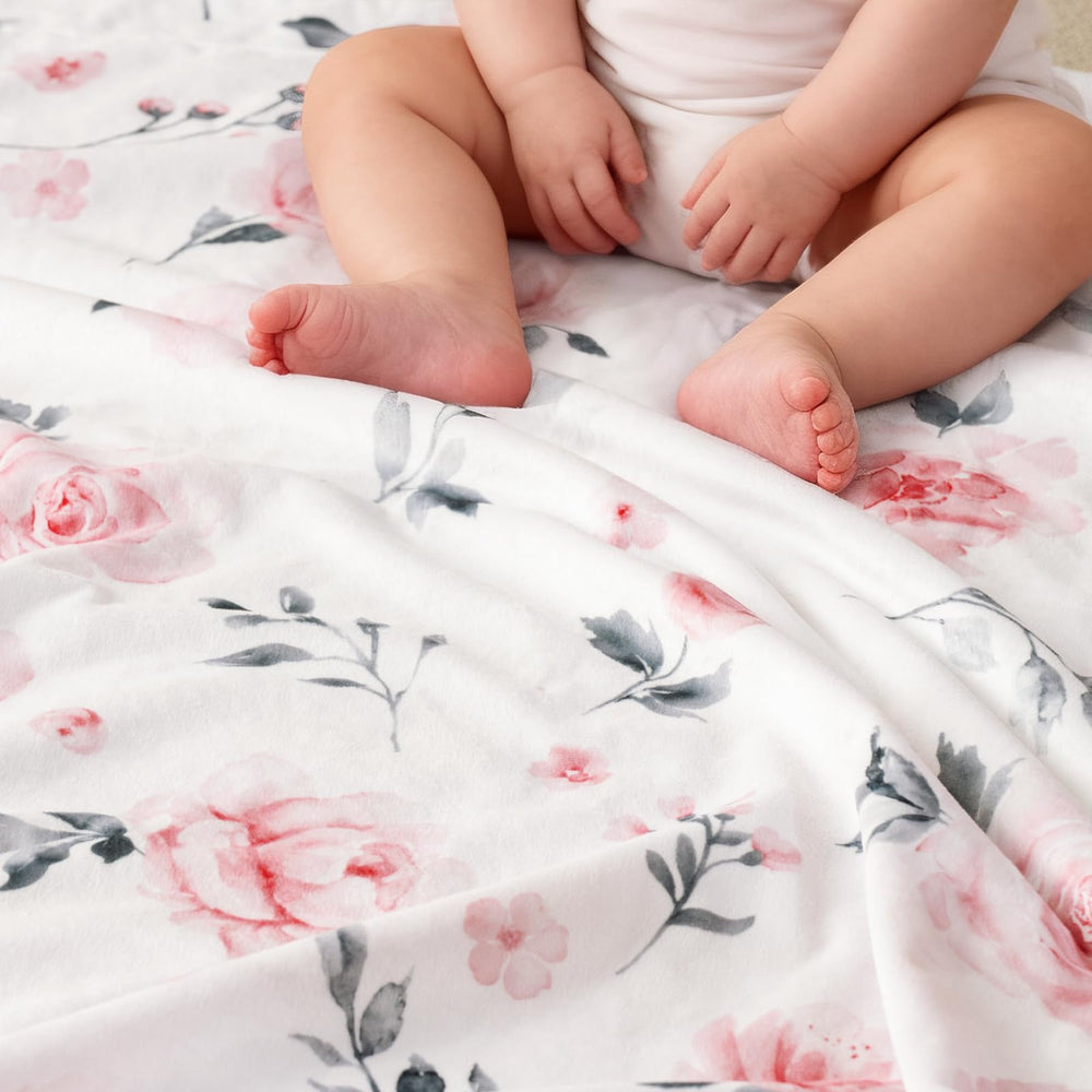 David's Kids Minky blanket in crib provides a snuggly nap surface.