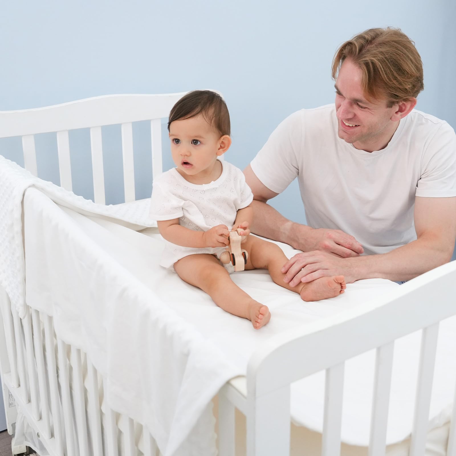 David's Kids blanket used as nursery wrap for baby privacy