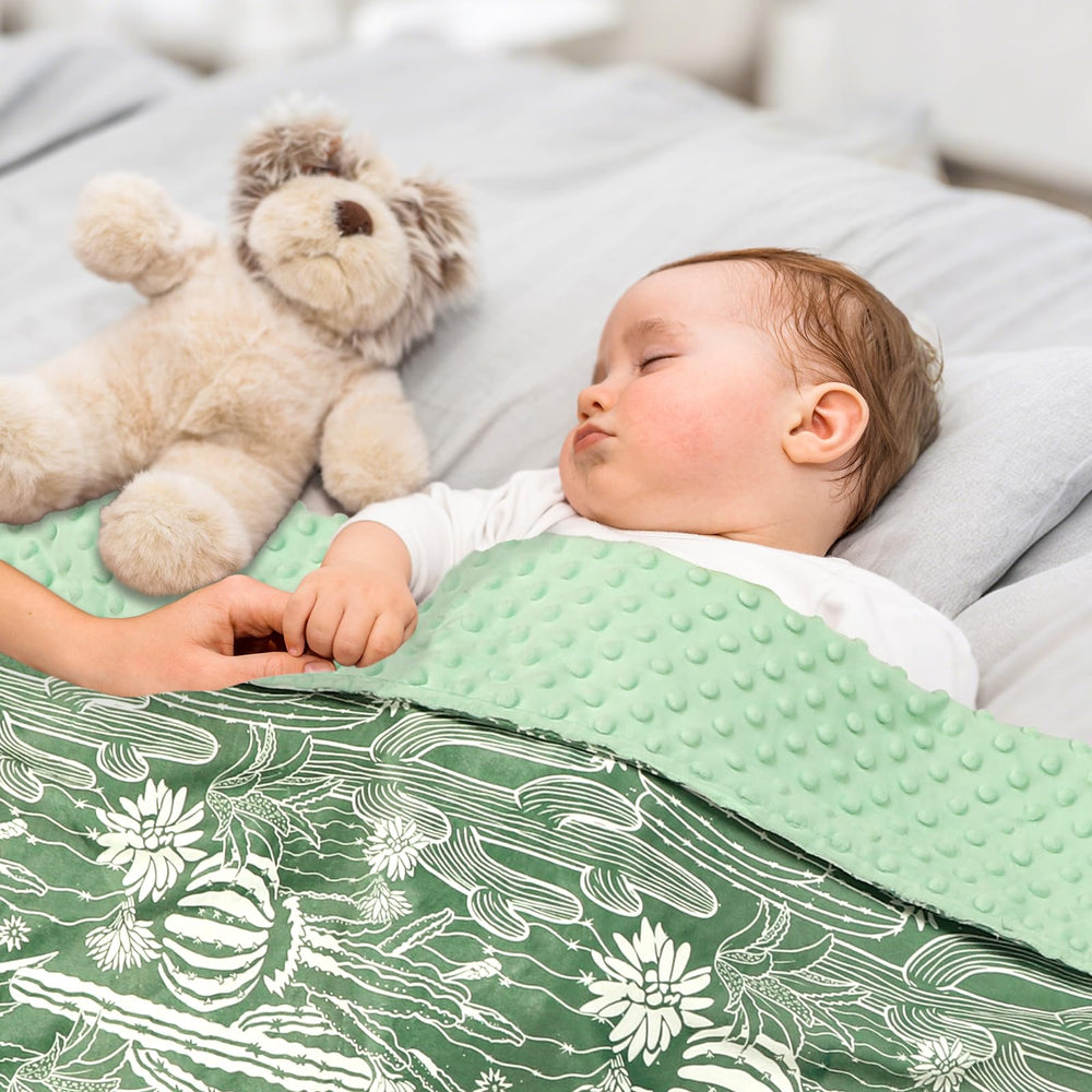 DAYEEBALL crib-size blanket with front pattern to spark imagination during naps.