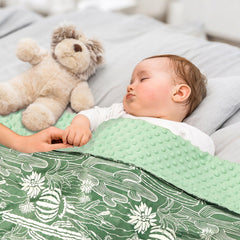 DAYEEBALL crib-size blanket with front pattern to spark imagination during naps.