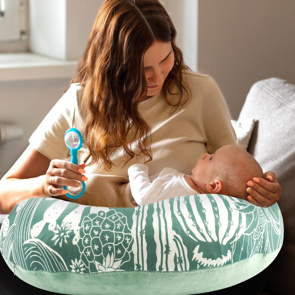 DayeeBall cuddly-soft plush side supports newborn comfort during feeds.