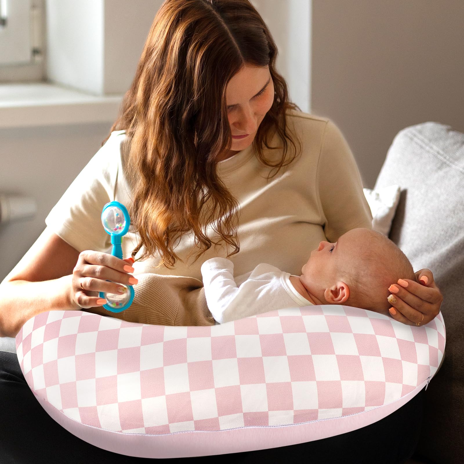 DAYEEBALL nursing cover pink checkerboard cozy, ideal for newborn feeding.