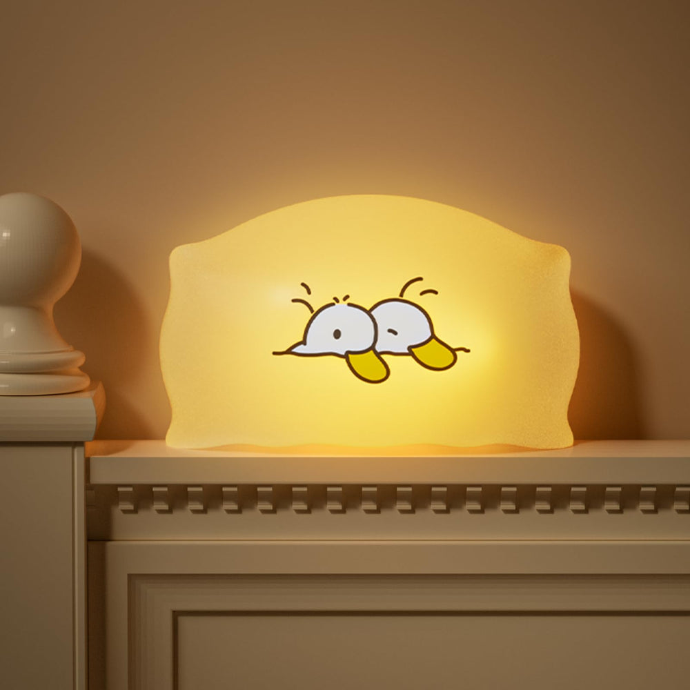 Dealswin squishy duck night light with warm glow for nighttime feeds and diaper changes.