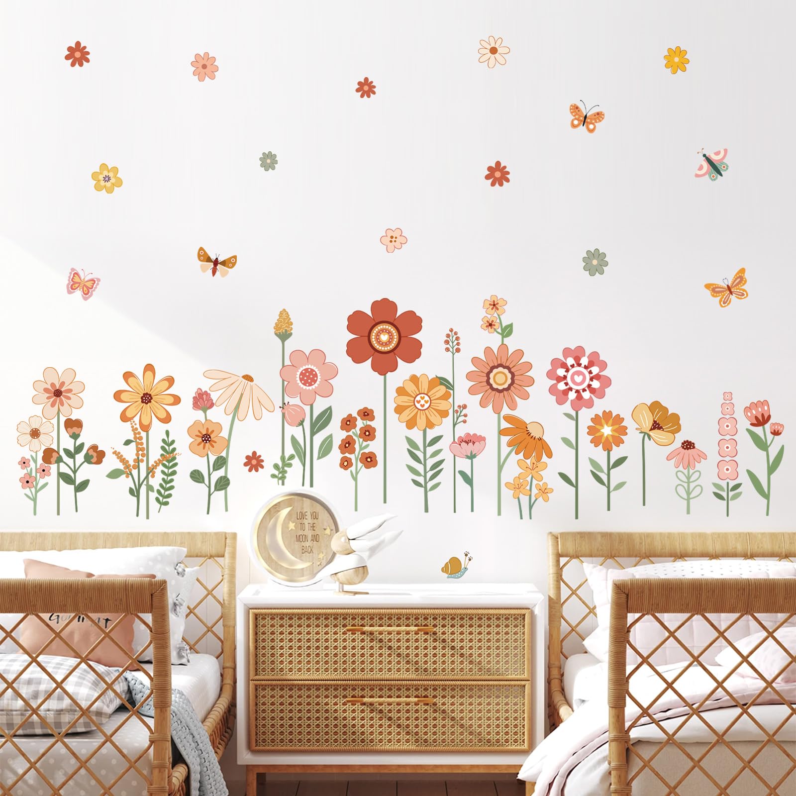 DecalMile boho nursery decals add soft floral charm to windows or furniture surfaces.