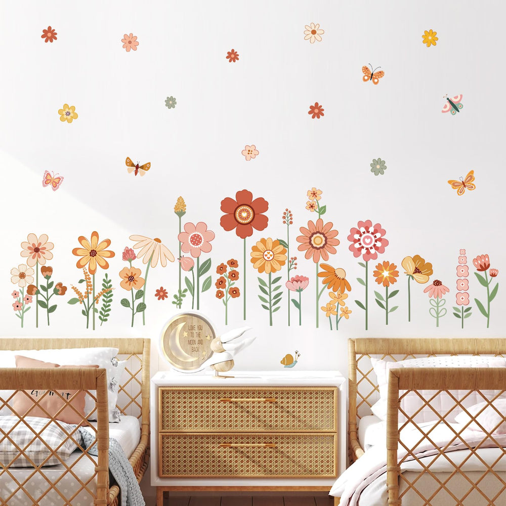 DecalMile boho nursery decals add soft floral charm to windows or furniture surfaces.