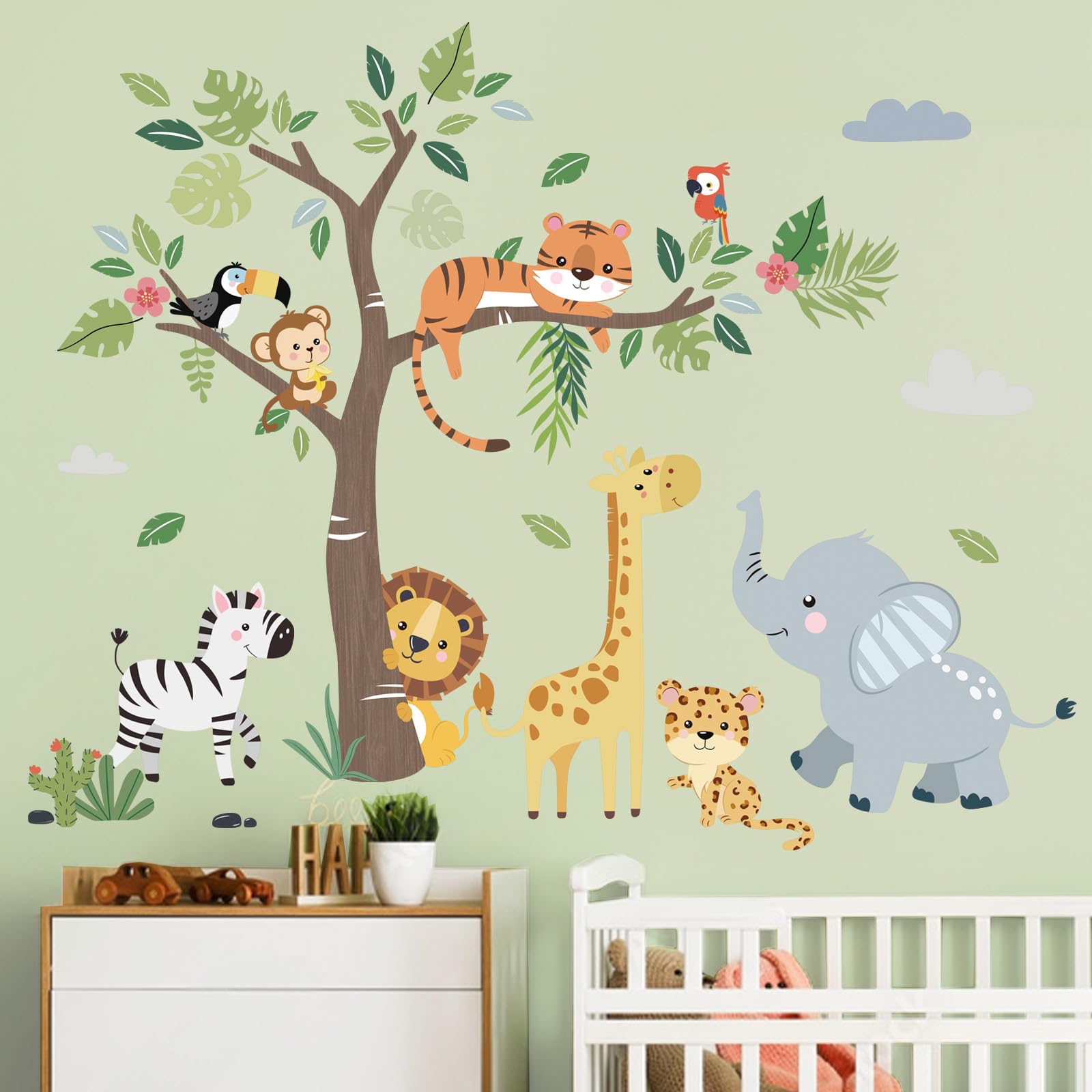 Decalmile giraffe wall decal with a tree; vibrant children's room decor.